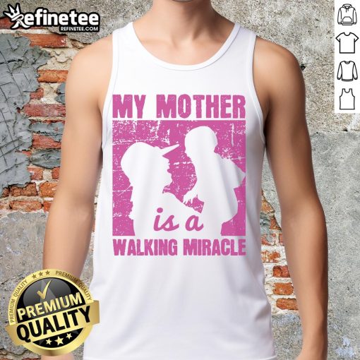 Woman wearing 'My Mother Is A Walking Miracle' tank top, showcasing a stylish and heartfelt tribute to moms.