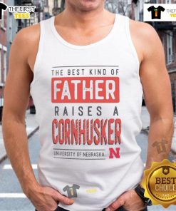 Alt Text: Father in a Cornhuskers tank top, showcasing Nebraska pride and support for the Nice Nebraska Cornhuskers.