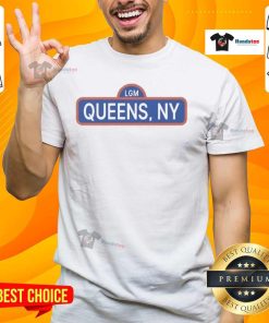 Alt Text: Stylish New York Mets LGM Queens NY T-shirt featuring team colors and logo, perfect for fans and casual wear.