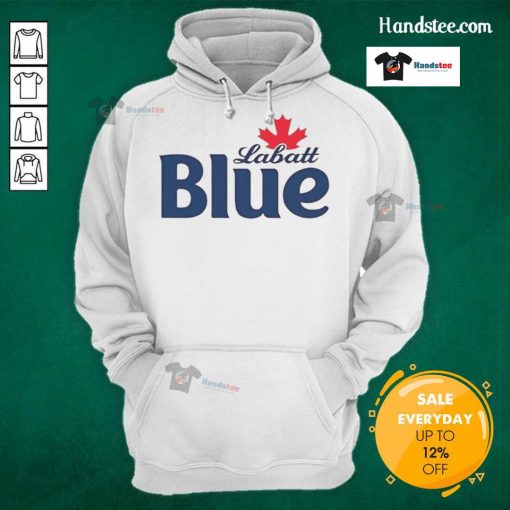 Pamela Anderson wearing a Labatt Blue hoodie, showcasing a stylish and casual look in a vibrant setting.