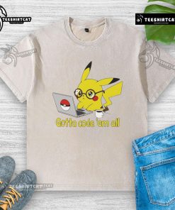 Alt Text: Cute Pikachu graphic on a washed t-shirt with 'Gotta Code 'Em All' slogan, perfect for Pokmon fans and coders.