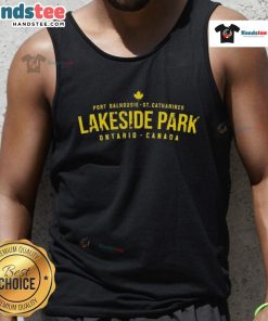 Person wearing a tank top at Nice Port Dalhousie Lakeside Park, St. Catharines, Ontario, Canada with scenic lake views.