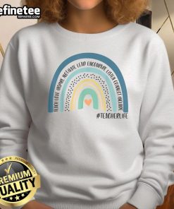 Colorful sweatshirt with 'Love, Inspire, Lead, Motivate' text, perfect for teachers who embrace creativity and positivity.