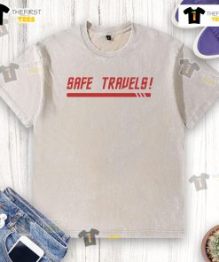 Casual traveler wearing a nice red shirt, showcasing a stylish washed t-shirt for outdoor adventures.