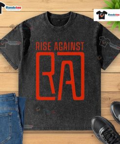 Nice Rise Against RA logo washed t-shirt displayed on a wooden surface, showcasing a trendy, casual style.