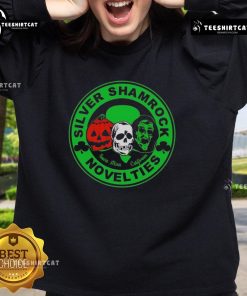 Alt Text: Cozy Nice Silver Shamrock Novelties Halloween character sweatshirt featuring spooky designs for festive celebrations.