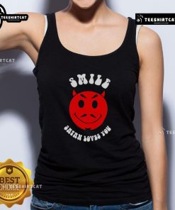 Model wearing a Nice Smile Satan Loves You tank top, showcasing a fun, playful design perfect for casual wear.
