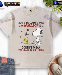 Snoopy graphic on a washed T-shirt with 'Just because I'm awake doesn't mean I'm ready to do things' quote.