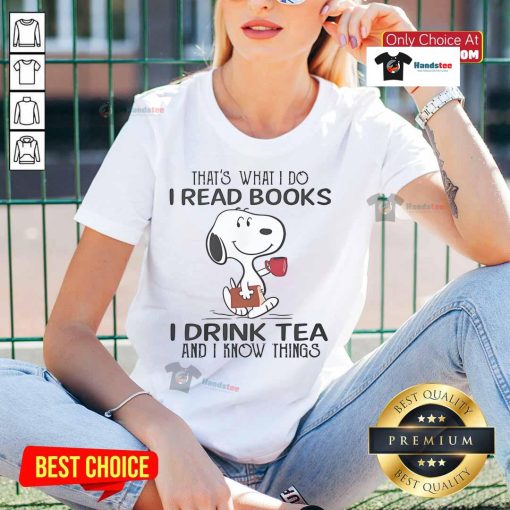 Alt Text: Snoopy graphic tee featuring the phrase 'I read books, I drink tea, and I know things' for ladies
