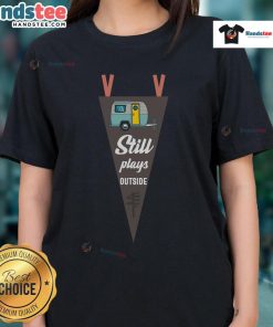 Nice lady playing outside an RV camper, wearing a stylish 'Camping' tee shirt, enjoying nature and outdoor adventures.