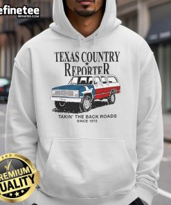 Nice Texas country reporter taking the back roads since 1972 in an American flag hoodie, showcasing Texas pride.
