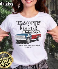 Texas country reporter shirt featuring an American flag car, celebrating back roads since 1972. Ideal for ladies.