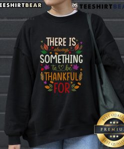 Alt Text: Cozy 'Nice Thanksgiving' sweatshirt with the phrase There is always something to be thankful for in festive colors.