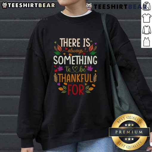 Alt Text: Cozy 'Nice Thanksgiving' sweatshirt with the phrase There is always something to be thankful for in festive colors.