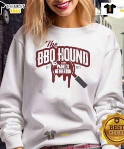Alt Text: Nice the BBQ Hound wearing a 2025 sweatshirt with Patrick Netherton, showcasing a fun BBQ event atmosphere.
