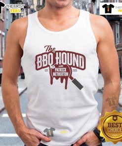 Nice the BBQ Hound wearing a tank top with Patrick Netherton at the 2025 BBQ festival, showcasing summer fun.