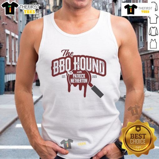 Nice the BBQ Hound wearing a tank top with Patrick Netherton at the 2025 BBQ festival, showcasing summer fun.