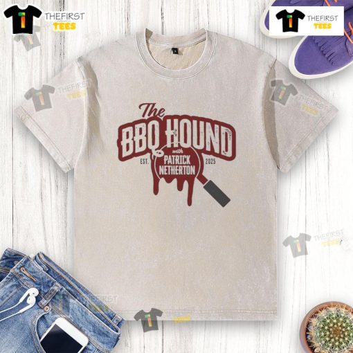 Alt Text: Nice the BBQ Hound wearing a 2025 washed t-shirt with Patrick Netherton, showcasing a fun outdoor barbecue scene.
