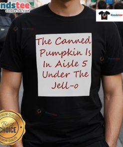Nice canned pumpkin in aisle 5, located under a colorful Jell-O t-shirt display at the grocery store.