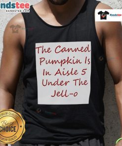 Alt Text: Canned pumpkin in aisle 5 beneath a Jell-O tank top at the grocery store, showcasing seasonal ingredients.