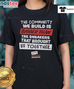 Together Ladies Tee featuring 'The Community We Build Is Bigger Than Us' slogan for a supportive and united vibe.