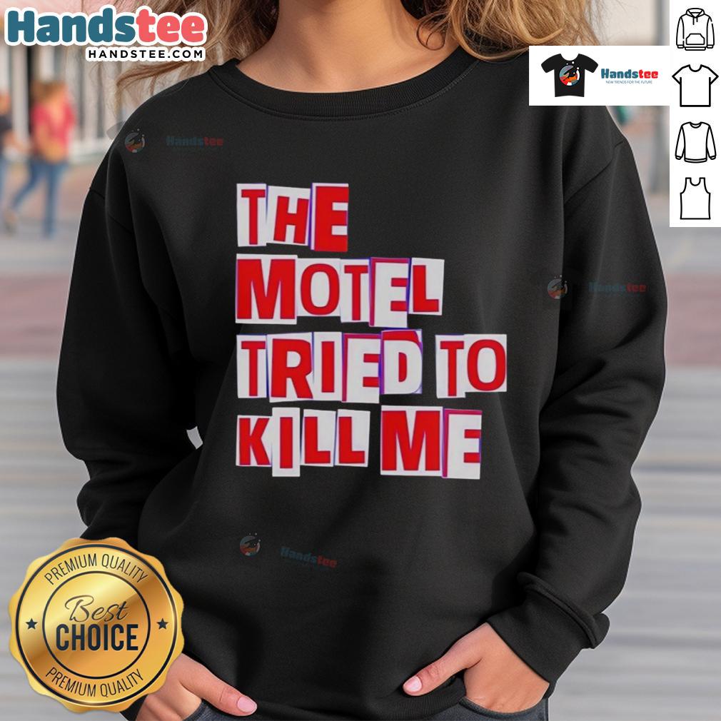 Nice The Motel Tried To Kill Me Sweatshirt Cozy 'Nice-The-Motel-Tried-To-Kill-Me' sweatshirt displayed on a wooden background, perfect for casual wear.