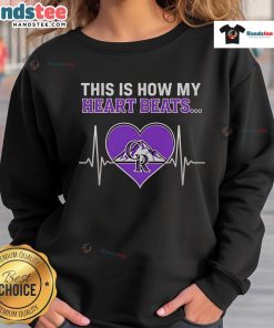 Alt Text: Cozy Colorado Rockies sweatshirt with This Is How My Heart Beats design, perfect for fans and chilly days.