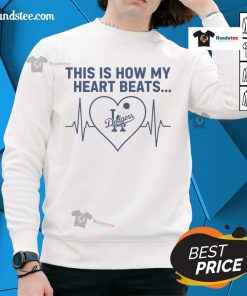 Los Angeles Dodgers sweatshirt featuring 'This Is How My Heart Beats' design, perfect for fans and casual wear.