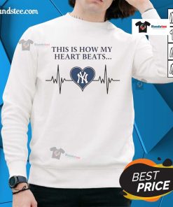 New York Yankees sweatshirt featuring 'This Is How My Heart Beats' design, perfect for fans showing team spirit.