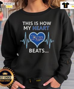 Cozy Tampa Bay Rays sweatshirt with 'This Is How My Heart Beats' design, perfect for fans and chilly game days.