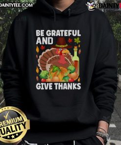 Cozy Thanksgiving hoodie featuring a turkey and 'Be Grateful and Give Thanks' design, perfect for the holiday season.