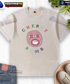 Alt Text: Tyler The Creator Cherry Bomb face graphic on a washed t-shirt, showcasing vibrant colors and stylish design.