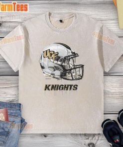 Nice UCF Knights dripping football helmet design on a washed T-shirt, perfect for fans of the University of Central Florida.
