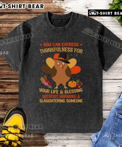 Turkey washed t-shirt expressing thankfulness without harm, featuring a playful design for Thanksgiving celebrations.
