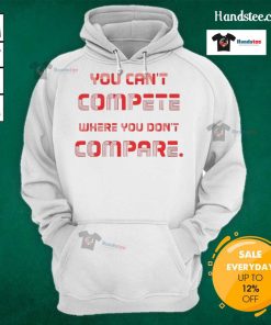 Stylish 'You Can't Compete Where You Don't Compare' hoodie in black, perfect for casual wear and motivational fashion.