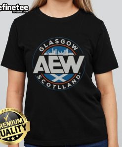 Official AEW Glasgow Scotland Ladies Tee featuring vibrant design and comfortable fit for wrestling fans and enthusiasts.