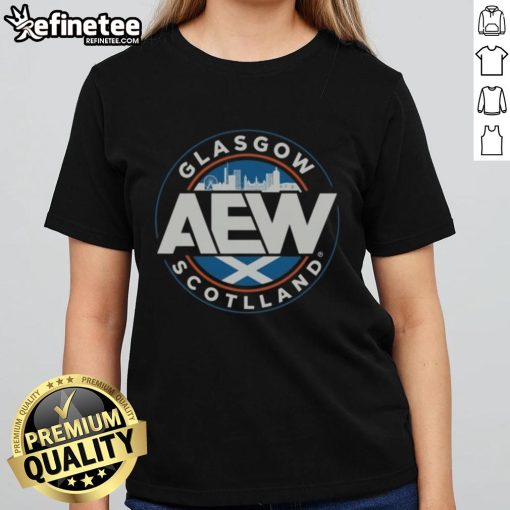 Official AEW Glasgow Scotland Ladies Tee featuring vibrant design and comfortable fit for wrestling fans and enthusiasts.