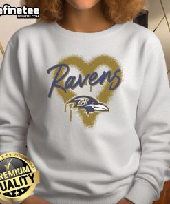 Alt Text: Official Baltimore Ravens Football Spray Heart Sweatshirt featuring a stylish design perfect for fans and game day attire.