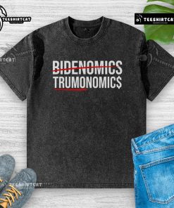 Alt Text: Official Bidenomics Maganomics washed t-shirt featuring bold graphics and a vintage look for political apparel enthusiasts.