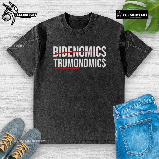 Alt Text: Official Bidenomics Maganomics washed t-shirt featuring bold graphics and a vintage look for political apparel enthusiasts.