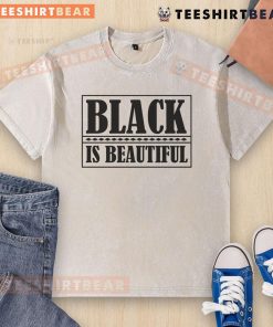 Official Black is Beautiful washed t-shirt showcasing a stylish design, perfect for celebrating black culture and fashion.