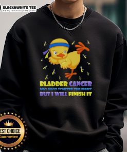 Cartoon chick performing a karate kick on a sweatshirt, symbolizing the fight against bladder cancer with a bold message.