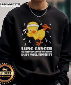Cartoon chick performing a karate kick on a sweatshirt, symbolizing the fight against lung cancer with strength and determination.