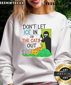 Alt Text: Official Don't Let ICE In Or The Cats Out Sweatshirt featuring a bold graphic design for cat lovers.