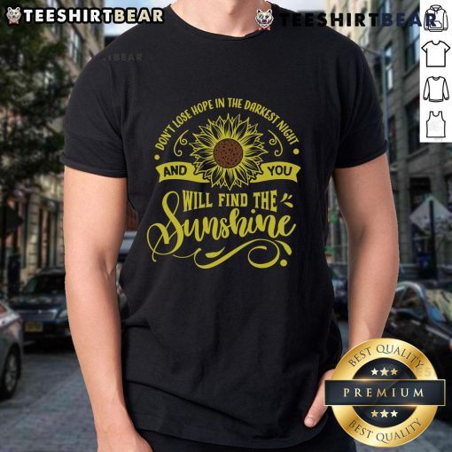 Official 'Don't Lose Hope In The Darkest Night And You'll Find The Sunshine' T-Shirt design with inspirational message.