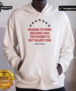 Person wearing Salary Coin hoodie on the way to work, highlighting the fear of buying the trendy apparel.