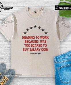 Official heading to work wearing a Salary Coin washed t-shirt, showcasing a casual and confident style.