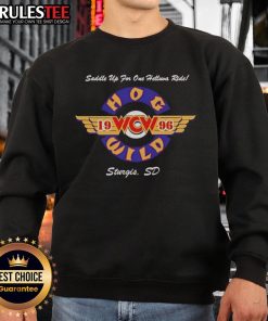 Alt Text: Official Hog Wild Saddle Up For One Helluva Ride 1996 sweatshirt featuring a vibrant graphic design and vintage style.