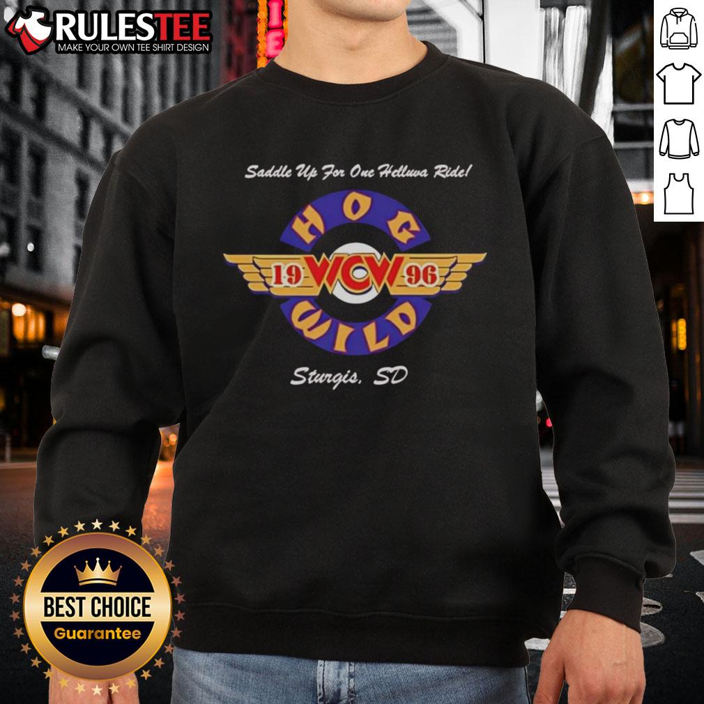 Official Hog Wild Saddle Up For One Helluva Ride 1996 Sweatshirt Alt Text: Official Hog Wild Saddle Up For One Helluva Ride 1996 sweatshirt featuring a vibrant graphic design and vintage style.