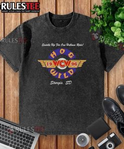 Official Hog Wild Saddle Up For One Helluva Ride 1996 washed t-shirt featuring vintage motorcycle graphics and bold lettering.